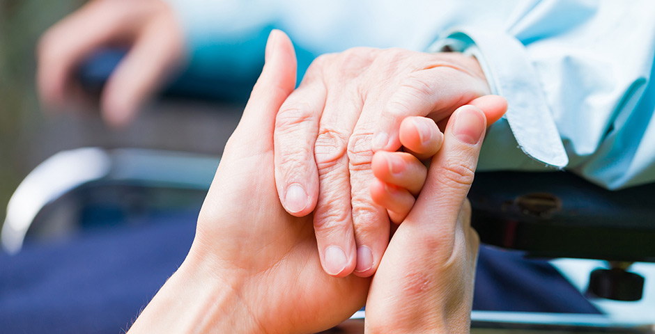 Homebound ministry elderly hands held by young hands photo